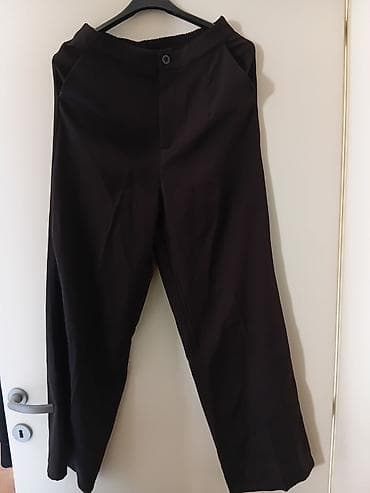 Crne elegantne pantalone - Kroj: ravan/klasičan, blago širi nogavice na lalafo.rs Crne elegantne pantalone - Kroj: ravan/klasičan, blago širi nogavice