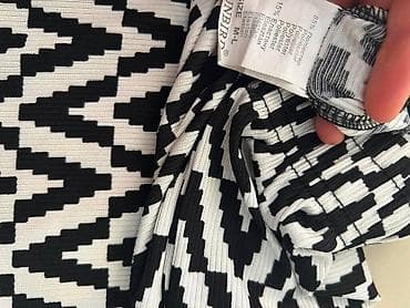 pletene: Crno-bele široke pantalone sa zig-zag šarom. - Kroj: ravne, široke — 3