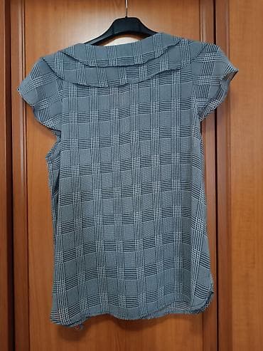 pull and bear majice: Ženska bluza bez rukava sa volanima - Model: lepršava bluza A-kroja — 2