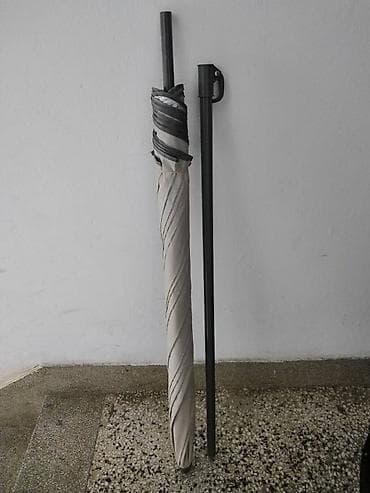 Suncobran za plažu sivi sa zglobom precnik oko 180 cm.,ocuvan,sipka