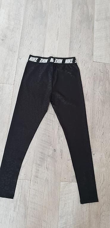 zenske sandale akcija: Nike ženske helanke – crne sa suptilnim animal printom. Elastični — 2