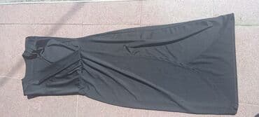 Headgear: Dve ženske haljine 1) Crna midi haljina - Elegantna, bez rukava - — 2