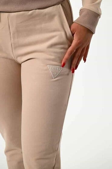 tech fleece zuti: Ženska dukserica žute boje sa dugim rukavima i okruglim izrezom — 32