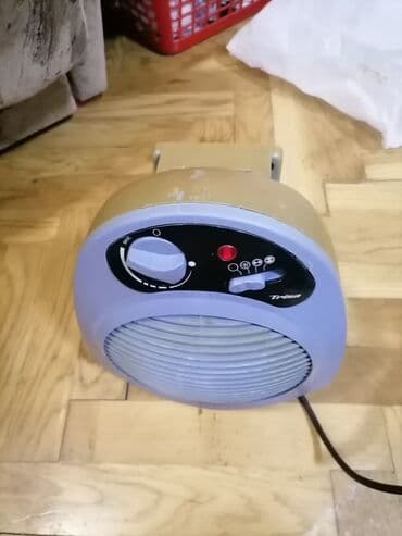 masazer i grejac za noge: Grejalica duvaljka 2300w Trisa dobra. Ispravna
 Mirjevo — 2