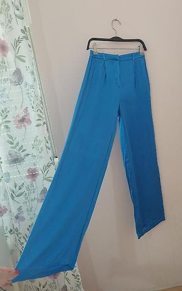 Pants: Ženske pantalone širokog kroja u intenzivnoj tirkizno-plavoj boji. - — 3