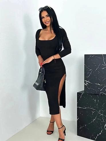 Elegantna crna midi haljina sa dugim rukavima i dubokim bočnim šlicem