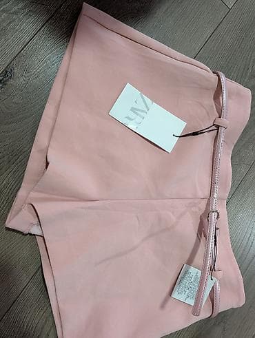 kvalitetne farmerke: ZARA ženske šorts-suknja u puder roze boji. Elegantna A-silueta sa — 2