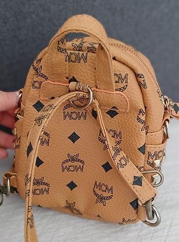vip smart satovi: Mini ranac MCM, boja konjak/karamela sa karakterističnim MCM monogram — 2