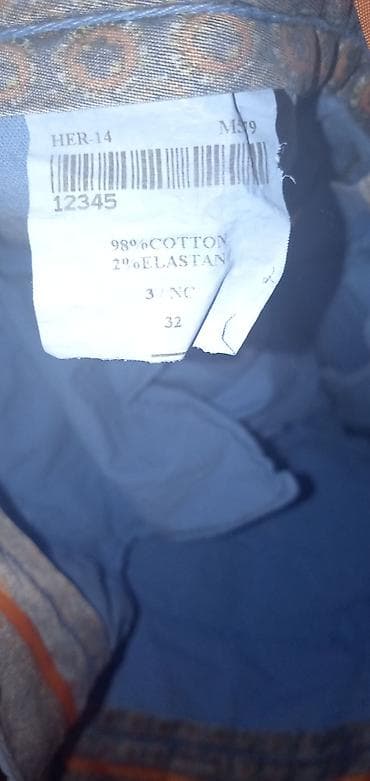 torbica kozna oficirska: Hermès muške pantalone – model chino, svetloplave boje. - Brend — 3