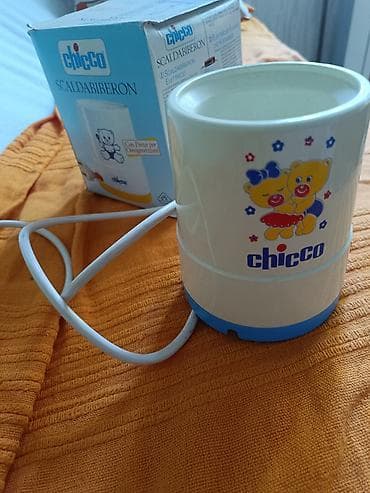 brojevi odece za decu: Prodajem chicco grejac za flasicu, proban u struji, ispod ima dugacak — 1