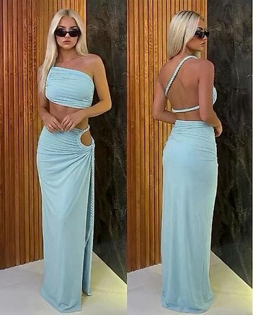Kompleti: Komplet duga suknja i crop top sa drapiranjem i otvorima. - Duga — 1