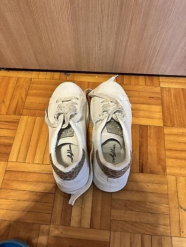 new balance 550 bele: Beli ženski patike sa platformom - Klasičan model u beloj boji sa — 3