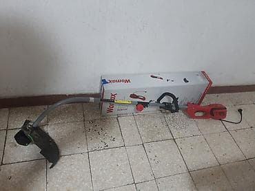 ražanj na akumulator: Womax električni trimer za travu W-RT 1200 koriscena 10 h - — 1