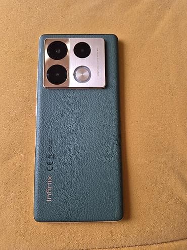 rucni sat sa kamerom: Infinix Note 40 Pro,star manje od dve godine. Zelena pozadina od — 1