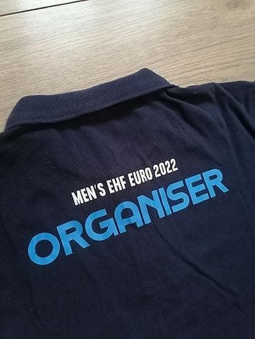 mona suknje 2022: Hummel muška polo majica – zvanični model MEN’S EHF EURO 2022 (Hungary — 9
