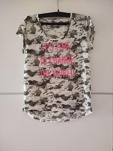 Majica Takko Fashion. Poluobim grudi 50, ramena 40. Ima elastina