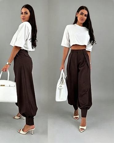 wurth pantalone: Ženske pantalone sa širokim nogavicama i manžetnama
2300 din 
S M L — 5