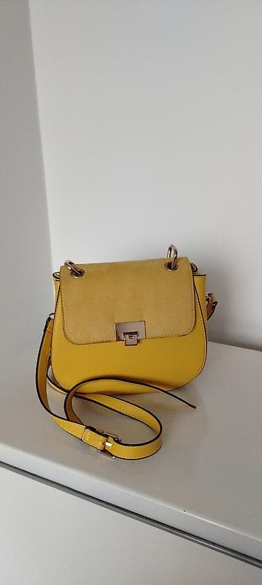 mona bela torbica: Prelepa ORSAY žuta torba, sa dužim kaišem i više predgrada iznutra. Na — 2