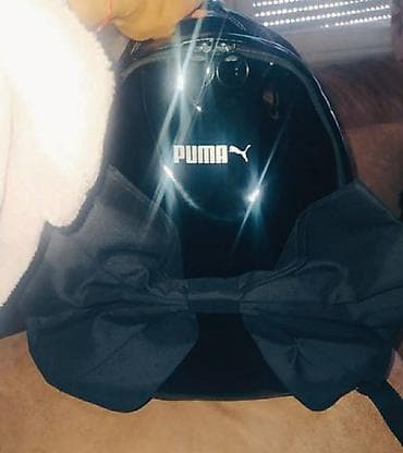 ranac puma: Puma mini ranac – crni, sjajni prednji panel sa belim Puma logotipom — 1