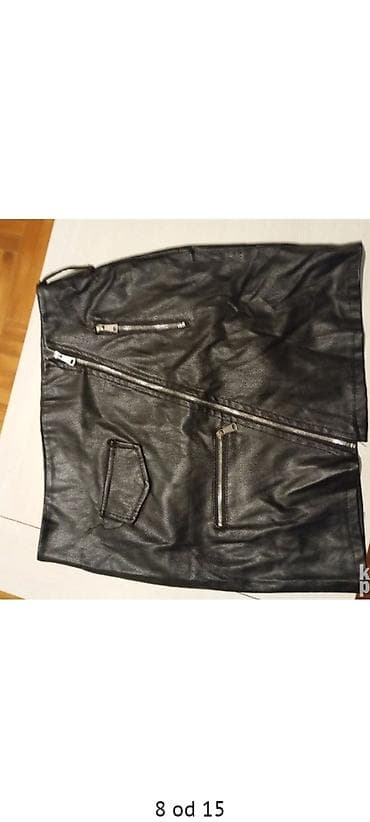 Swimwear: Crna kožna mini suknja, rokerskog stila. - Materijal: veštačka koža — 1