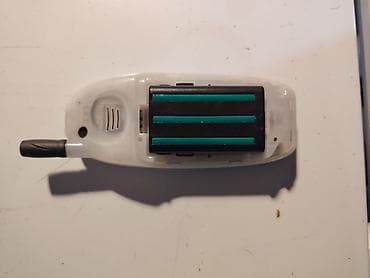 rashladni uredjaji na vodu: Trium preklopni mobilni telefon (retro model), radi na svim mrežama — 5