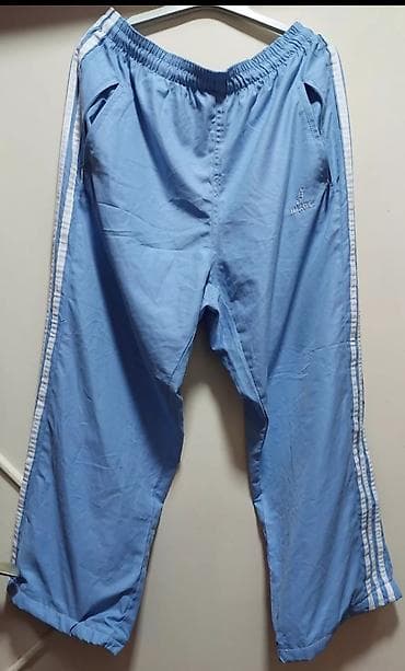 Trenerke: Sportske pantalone – svetloplave - Model: široke/trening pantalone sa — 1