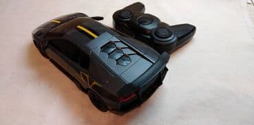 dzipovi na akumulator: Lamborghini na daljinski,2,4 GHz. razmera tj. 20 cm.u auto 3 x 1, 5 — 3