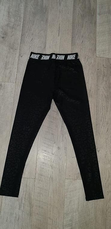 zenske sandale akcija: Nike ženske helanke – crne sa suptilnim animal printom. Elastični — 5