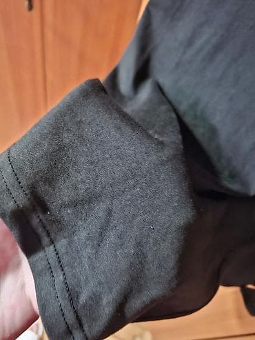 kombinezoni svečani: Elegantna crna haljina bez rukava, uskog kroja do kolena. Gornji deo — 2