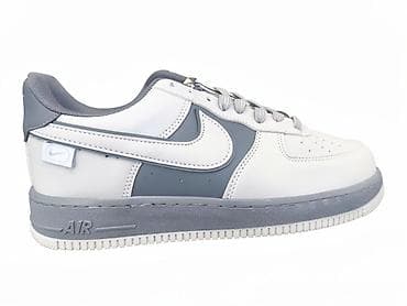 nike air force crne: Nike Air Force 1 Low, bele i sivo‑grafitne boje. - Silueta: klasični — 1