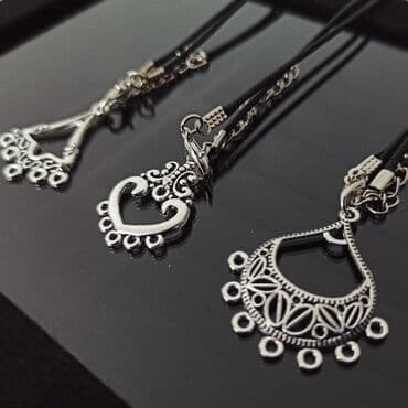 krema sa puzevom sluzi: Pendant necklace, Material: Leather — 1