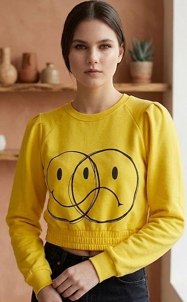 Ženska žuta dukserica sa printom – kratki kroj - Boja: intenzivno