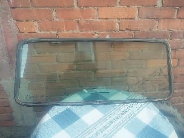 zadnje stop svetlo: Staklo zadnjih vrata Lada Niva. Polovno, ocuano. Skinuto sa — 1