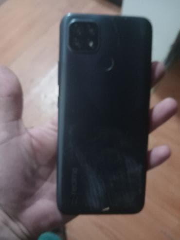 starinski fiksni telefoni: Realme C21 (RMX3201) - Ekran: 6.5" HD+ sa „waterdrop“ notch‑om - — 4