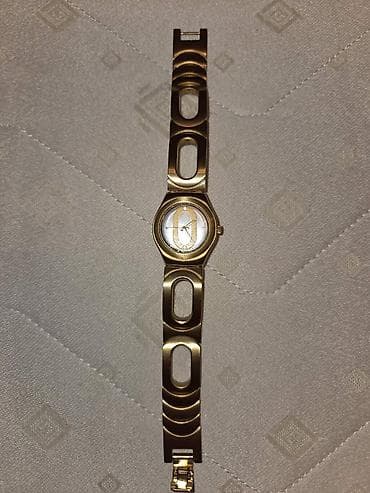 satovi swatch: Swatch ženski ručni sat – Irony Stainless Steel (kvarts) - Model iz — 1