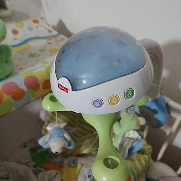 tenk igracka za decu: Vrteška za krevetac Fisher Price Ima tri različite melodije, projektor — 3