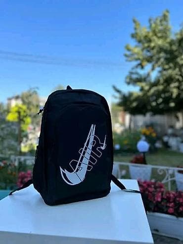 doca torbe nis: Rančevi sa štampom Nike motiva - Modeli: roze ranac sa žutim Nike — 2