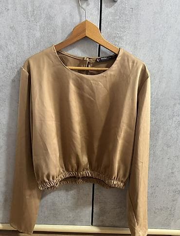 Bluza dugih rukava u boji karamela/bež, brenda P… (etiketa “P…” na lalafo.rs Bluza dugih rukava u boji karamela/bež, brenda P… (etiketa “P…”