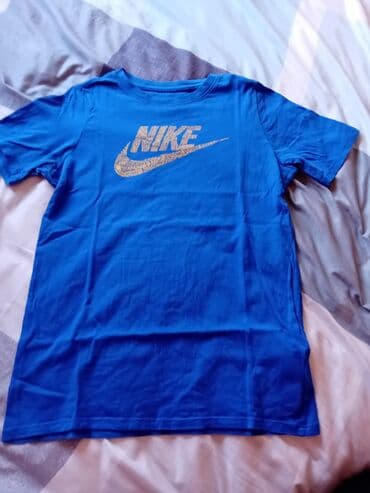 svecani zenski kompleti sa pantalonama: Original Nike ženska majca u ekstra stanju, samo probana — 1