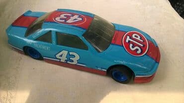 kinder joy harry potter figurice: Racing champions Pontiac oko 1:22(20,7 cm.) China, popravljenamalo — 1