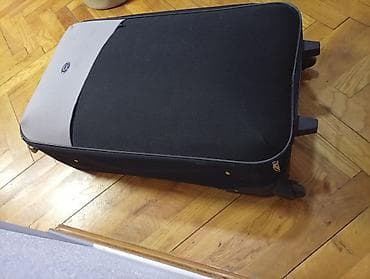 sat za ruku: Veliki kofer na točkićima sa teleskopskom ručkom. OKO 75 40 25. dob — 3