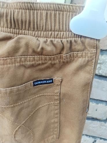 termo pantalone za decake: Calvin Klein farmerke za dečake, veličina 8. Struk po 31 tegli do — 5