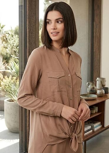 Elegantna ženska bluza u boji peska. - Kroj: opušten, duži model sa