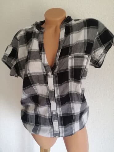Košulje: Karirana kosuljica kao nova, bez ostecenja.
Velicina M — 2