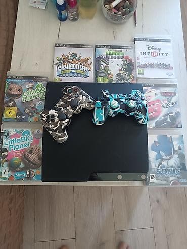rostilj beli: PlayStation 3 Slim konzola (crna) sa 2 bežična DualShock 3 kontrolera — 4