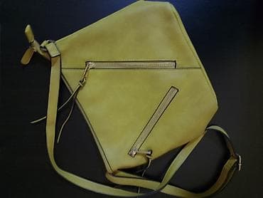 Ženska torba u oker boji,sa dzepicima i podesivim duzinom na lalafo.rs Ženska torba u oker boji,sa dzepicima i podesivim duzinom