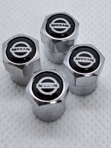imt 506 ulje u menjacu: Univerzalne metalne ventil kapice sa logom NISSAN Univerzalne metalne — 1