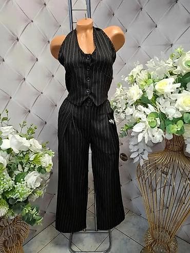 butik 13 kompleti: Ženski dvodelni komplet – prsluk + pantalone sa prugama - Model — 2