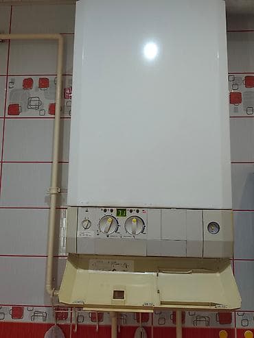 cesma za dvoriste cena: Gasni kotao kombinovani fasadni Bosch-Junkers  snage 28kW potpuno — 4