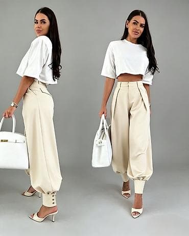 wurth pantalone: Ženske pantalone sa širokim nogavicama i manžetnama
2300 din 
S M L — 3